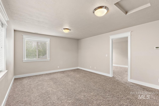 13991 W Milford Dr, Boise, ID 83713 - carpeted spare room with a textured ceiling and baseboards
