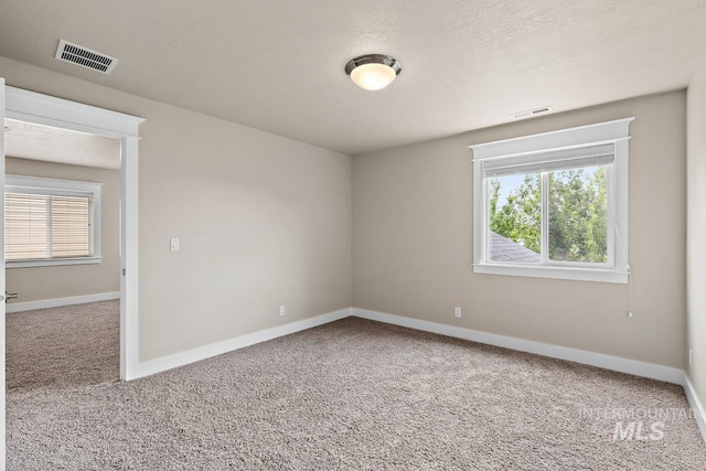 13991 W Milford Dr, Boise, ID 83713 - carpeted empty room featuring healthy amount of natural light and baseboards