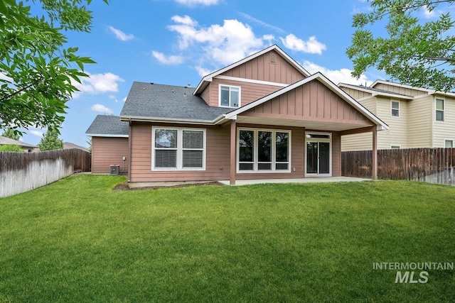 13991 W Milford Dr, Boise, ID 83713 - back of property with roof with shingles, board and batten siding, a patio area, and cooling unit