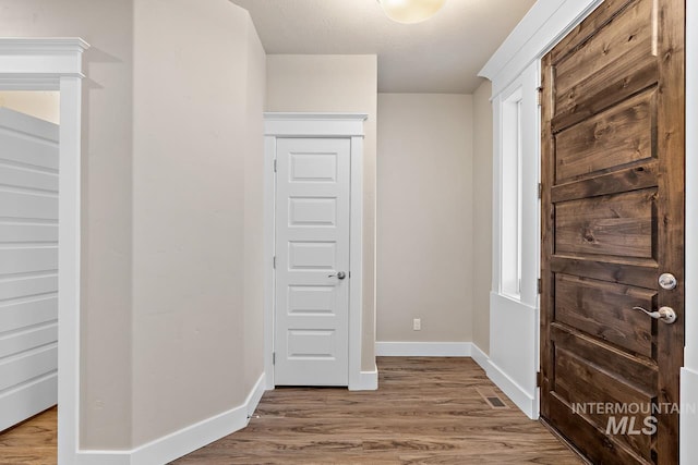 13991 W Milford Dr, Boise, ID 83713 - entryway featuring wood finished floors and baseboards