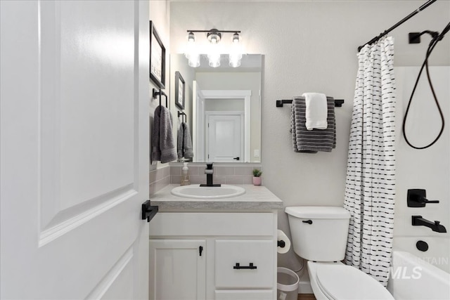 full bathroom with vanity, toilet, shower / tub combo with curtain, and decorative backsplash