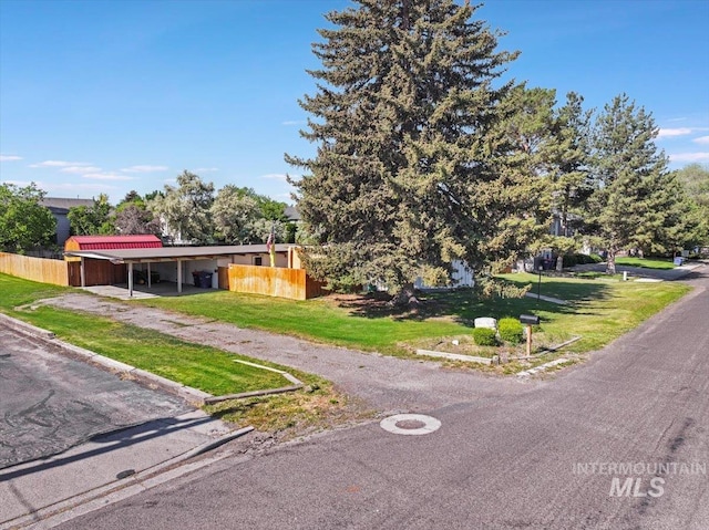 167 W Robbins, Twin Falls, ID 83301 - view of front of home with a carport and driveway