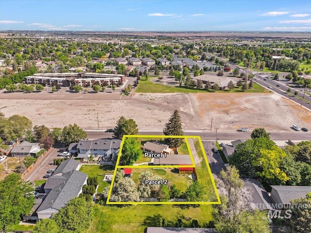 167 W Robbins, Twin Falls, ID 83301 - aerial perspective of suburban area with property parcel outlined