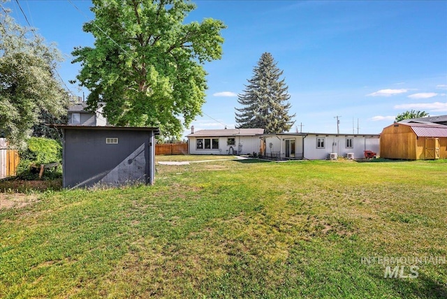 167 W Robbins, Twin Falls, ID 83301 - rear view of house with a storage unit