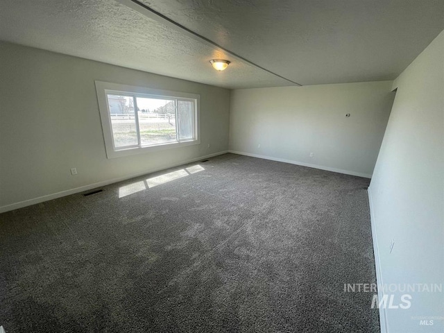956 SE Hamilton Rd, Mountain Home, ID 83647 - carpeted empty room featuring baseboards