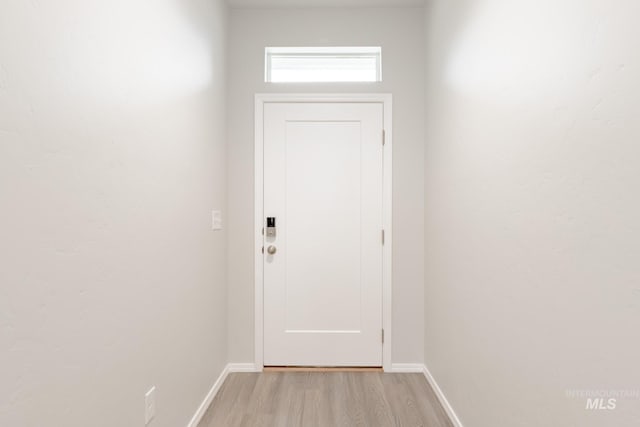 doorway featuring light hardwood / wood-style flooring