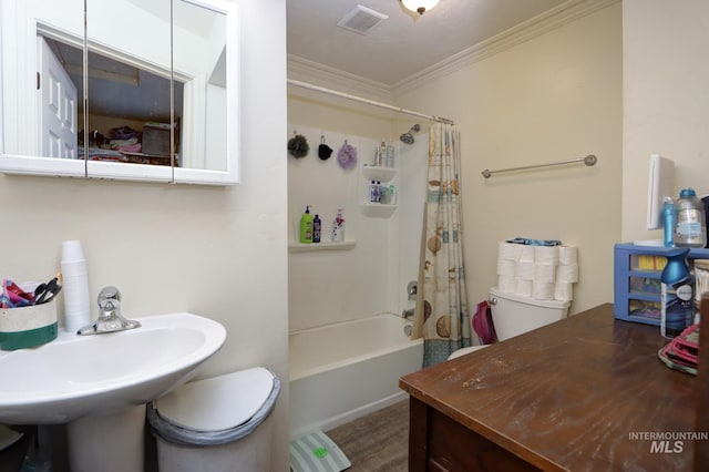 bathroom with toilet, visible vents, shower / tub combo with curtain, and ornamental molding