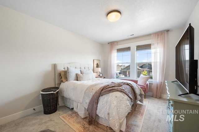 10411 Hazy Glen Dr, Nampa, ID 83687 - bedroom with light colored carpet and multiple windows