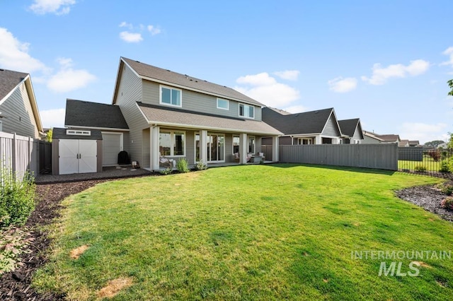 10411 Hazy Glen Dr, Nampa, ID 83687 - back of property with a storage unit and a fenced backyard