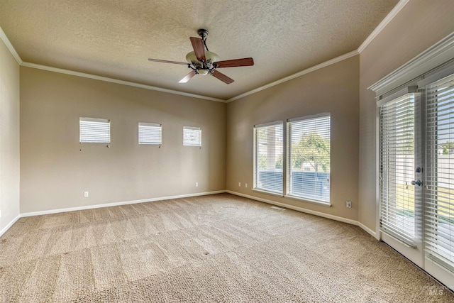 empty room with light carpet, baseboards, and ornamental molding