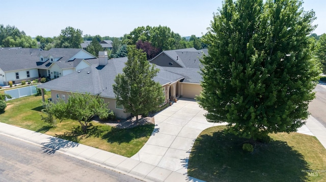 drone / aerial view featuring a residential view