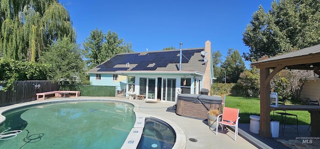 view of pool with a gazebo, a patio area, and a hot tub