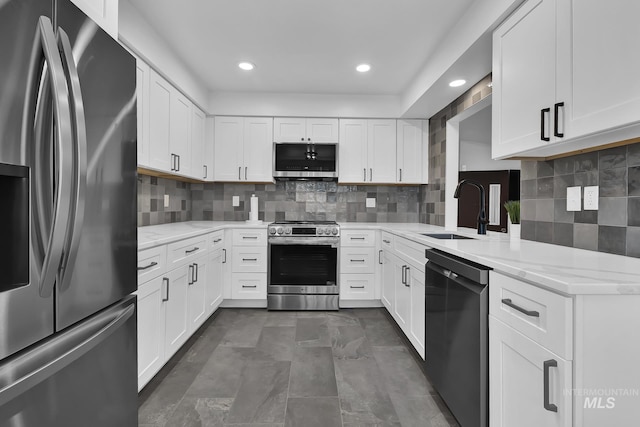 2323 W Lemhi St, Boise, ID 83705 - kitchen featuring light stone counters, a sink, white cabinets, and stainless steel appliances