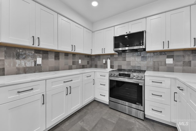 2323 W Lemhi St, Boise, ID 83705 - kitchen with appliances with stainless steel finishes, white cabinets, and recessed lighting