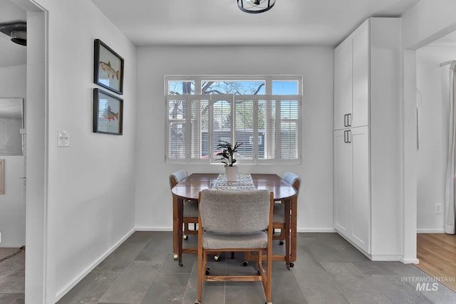2323 W Lemhi St, Boise, ID 83705 - dining room featuring baseboards and tile patterned flooring