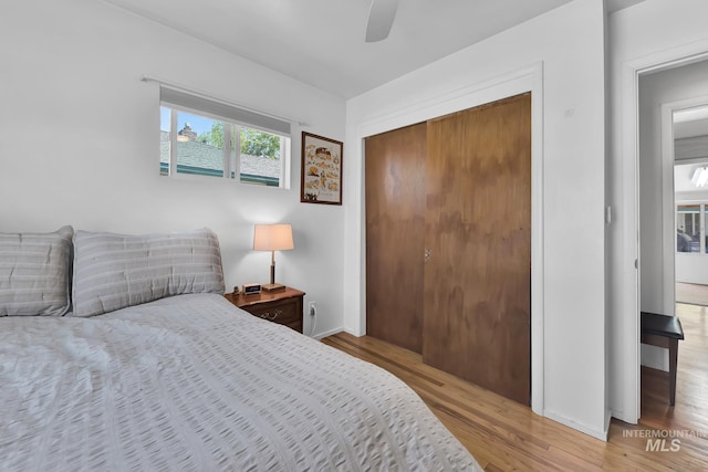 2323 W Lemhi St, Boise, ID 83705 - bedroom with baseboards, a ceiling fan, a closet, and wood finished floors
