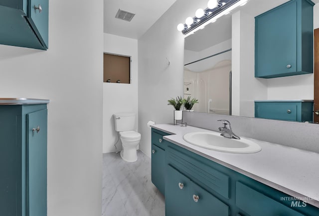 2323 W Lemhi St, Boise, ID 83705 - bathroom featuring visible vents, a shower, vanity, toilet, and marble finish floor