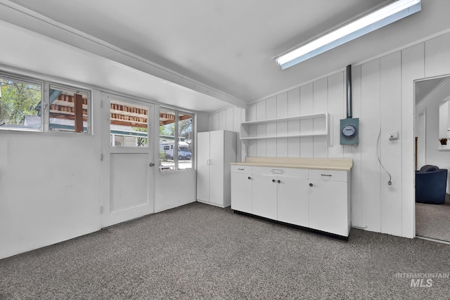 2323 W Lemhi St, Boise, ID 83705 - kitchen featuring light countertops, open shelves, and white cabinetry