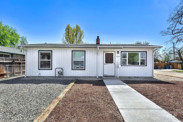 2323 W Lemhi St, Boise, ID 83705 - view of front of property featuring fence and a chimney