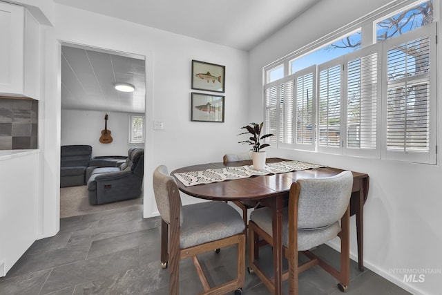 2323 W Lemhi St, Boise, ID 83705 - dining area with baseboards and a wealth of natural light