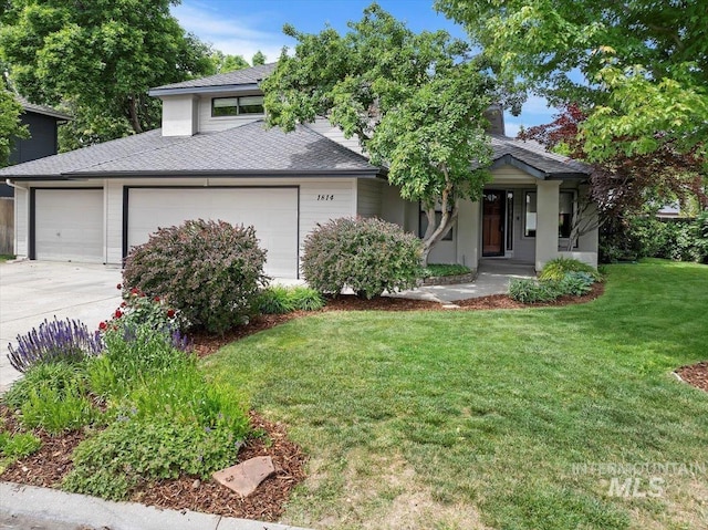 1814 E Spinnaker Ct, Boise, ID 83706 - view of front of property featuring a garage, a front lawn, concrete driveway, and a shingled roof