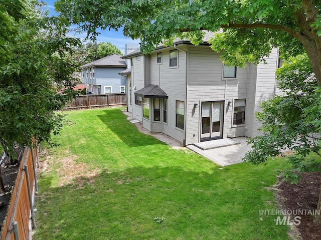 1814 E Spinnaker Ct, Boise, ID 83706 - rear view of property with a patio