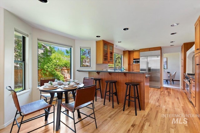1814 E Spinnaker Ct, Boise, ID 83706 - dining space with light wood-type flooring and recessed lighting
