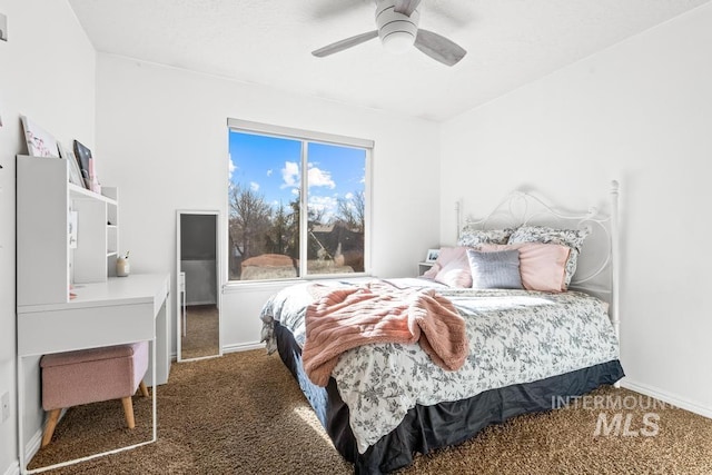 carpeted bedroom featuring ceiling fan