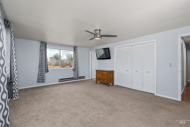 101 Patton St, Marsing, ID 83639 - unfurnished bedroom with a baseboard heating unit, carpet, a closet, and baseboards