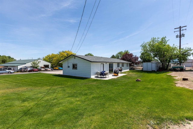 101 Patton St, Marsing, ID 83639 - view of grassy yard featuring a patio area