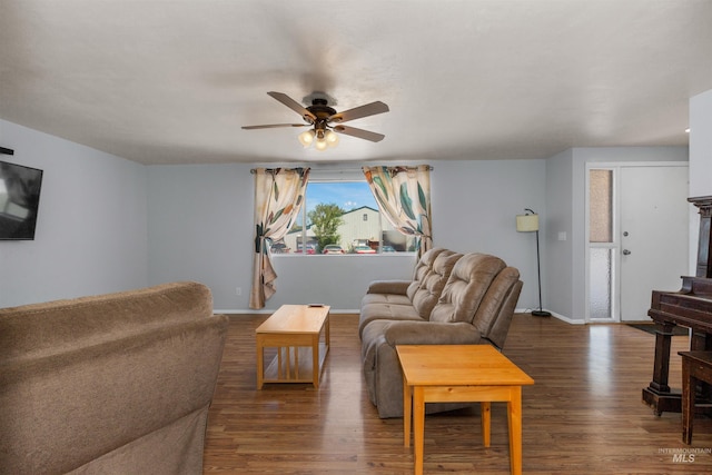 101 Patton St, Marsing, ID 83639 - living room with ceiling fan, wood finished floors, and baseboards