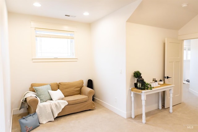 sitting room with carpet floors