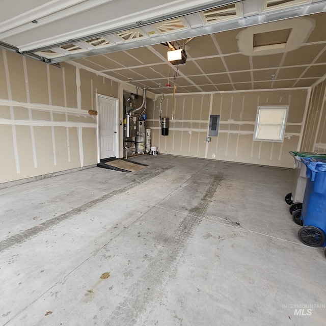 garage featuring electric panel and a garage door opener