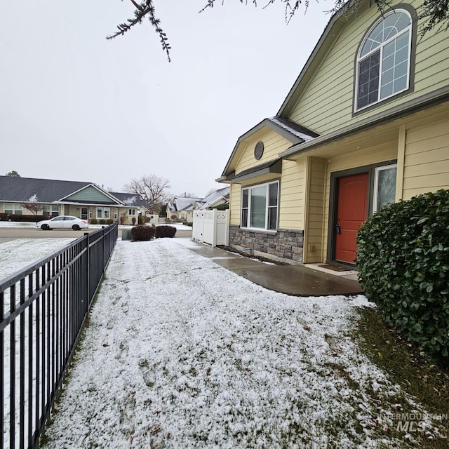 view of yard covered in snow