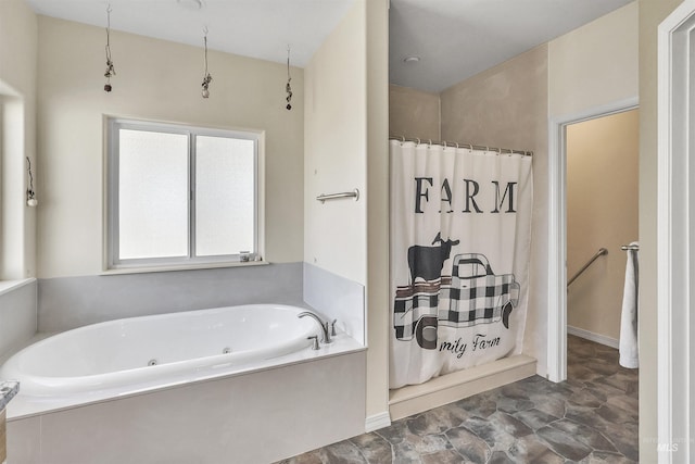 bathroom with a tub with jets and a shower with shower curtain