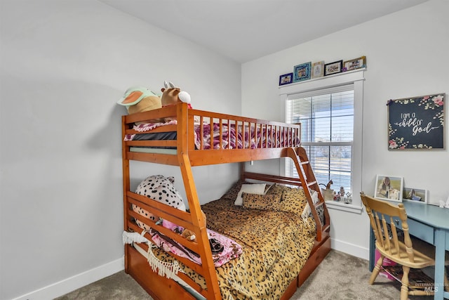 bedroom with carpet and baseboards