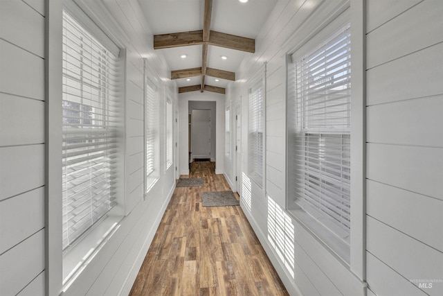 hall with recessed lighting, beam ceiling, and wood finished floors