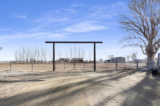 exterior space with a rural view and fence