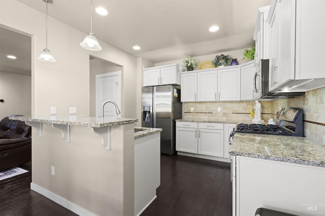 5359 N Landon Creek Pl, Meridian, ID 83646 - kitchen featuring white cabinetry, appliances with stainless steel finishes, and dark wood-style flooring
