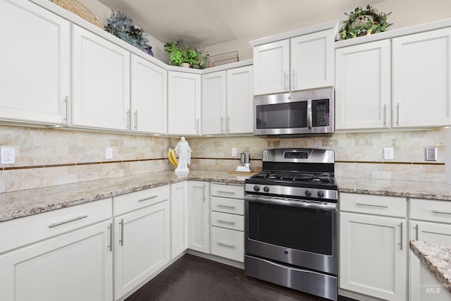 5359 N Landon Creek Pl, Meridian, ID 83646 - kitchen featuring white cabinets, stainless steel appliances, light stone countertops, and backsplash