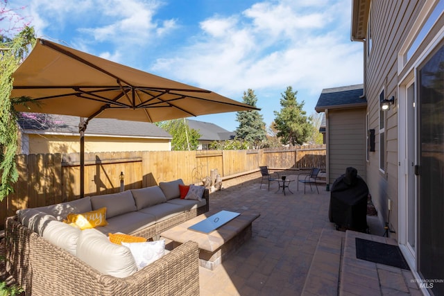 5359 N Landon Creek Pl, Meridian, ID 83646 - view of patio / terrace featuring an outdoor living space, a fenced backyard, and area for grilling