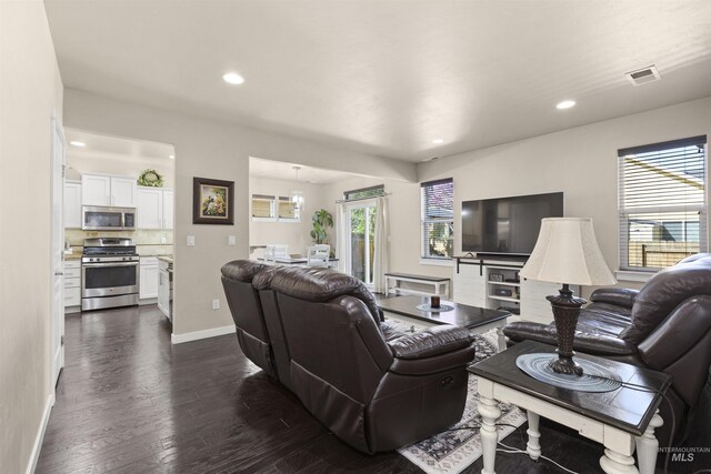 5359 N Landon Creek Pl, Meridian, ID 83646 - living area with visible vents, baseboards, recessed lighting, and dark wood-style flooring