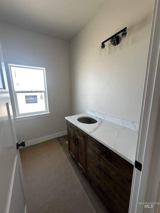 941 Gregory Way, Twin Falls, ID 83301 - bathroom featuring vanity and baseboards