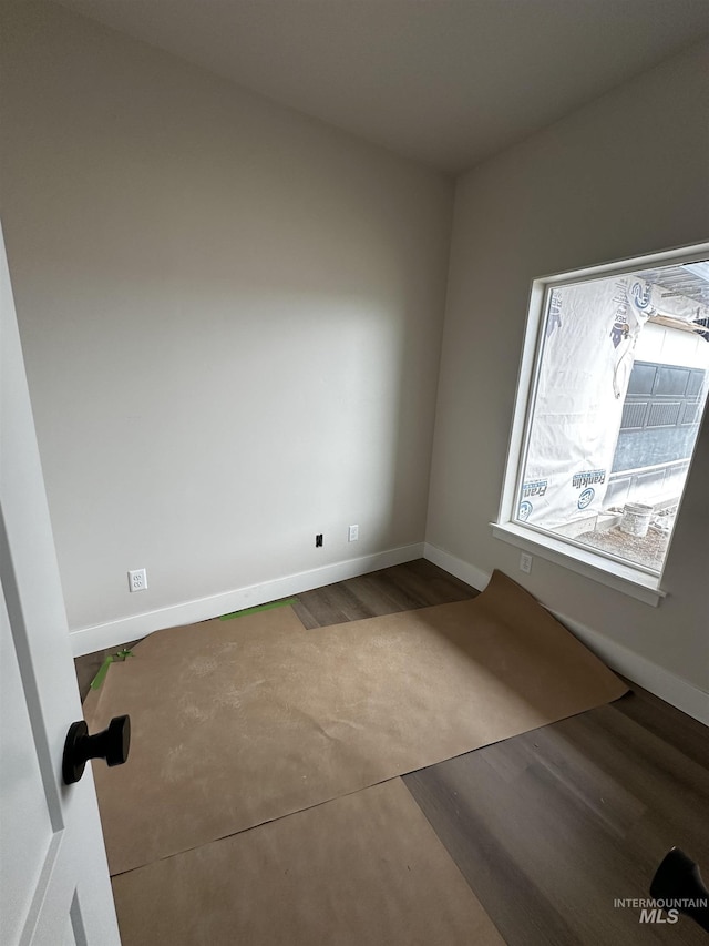 941 Gregory Way, Twin Falls, ID 83301 - empty room with baseboards and wood finished floors