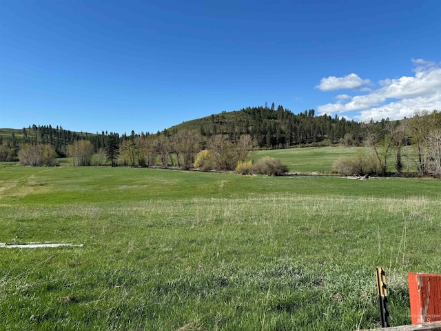 view of mountain feature featuring a rural view