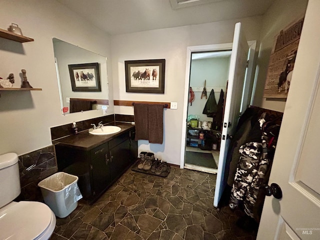 170 Red Fir, Kooskia, ID 83539 - bathroom with toilet, stone finish flooring, and vanity