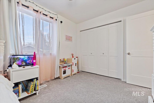 playroom featuring visible vents and light carpet