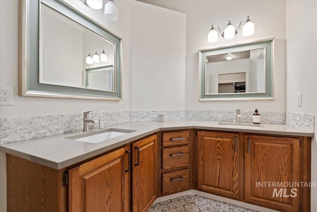 bathroom featuring double vanity and a sink