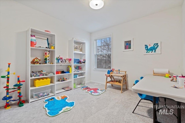 game room featuring carpet flooring and baseboards