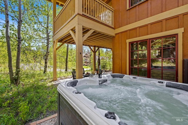 view of patio with a hot tub